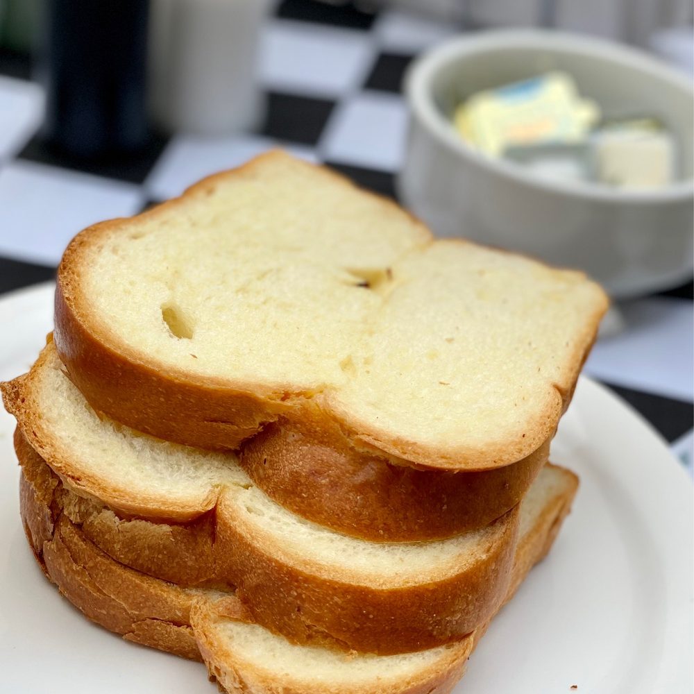 Val’s Delicatessen - a stack of slices of bread - Salad Near Me - West Bloomfield, Michigan Val’s Delicatessen - a stack of slices of bread - Salad Near Me - West Bloomfield, Michigan
