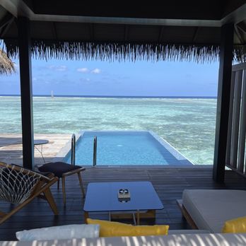 Designed Travel - Our overwater bungalow room in the Maldives with private pool - Travel Agents Near Me Designed Travel - Our overwater bungalow room in the Maldives with private pool - Travel Agents Near Me
