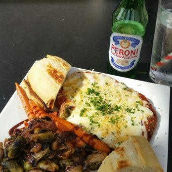 Crust Pizzeria - Chicken parmesan with Brussel sprouts n carrots. I'm sorry not worth $18.00. - Pizza Near Me - Carlsbad, California Crust Pizzeria - Chicken parmesan with Brussel sprouts n carrots. I'm sorry not worth $18.00. - Pizza Near Me - Carlsbad, California