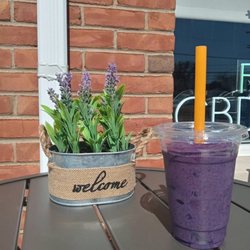 Euphoria Integrated Health & Wellness - Mixed Berry smoothie out front of Euphoria on a beautiful day :)