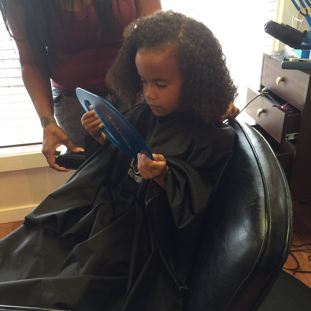 Shear Glamour Salon - My daughter checking out her new do courtesy of Alicia at Shear Glamour - Hair Extensions Near Me - San Antonio, Texas