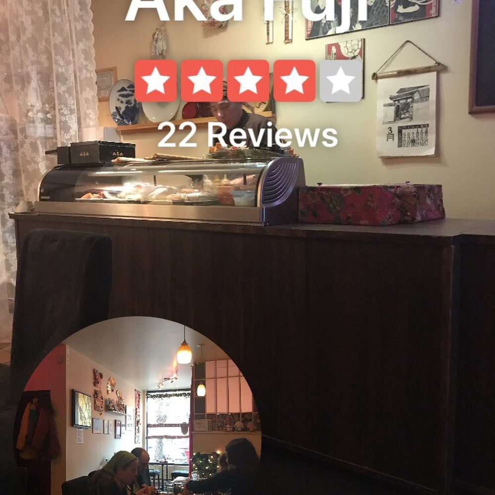 Aka-Fuji - two people sitting at a table in a restaurant - Sushi Bars Near Me - Verdun, Quebec