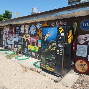 Edith Lucielle's Bait Shack & Wing Depot - The back wall and the bait machine - American Near Me - Cedar Rapids, Iowa