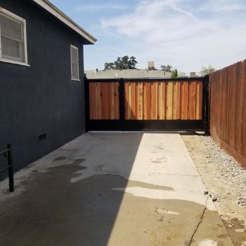 Top Choice Fencing - Driveway gate view from front yard. - Fences & Gates Near Me - Fresno, California Top Choice Fencing - Driveway gate view from front yard. - Fences & Gates Near Me - Fresno, California