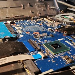 Tech 911 - Dusty Laptop Motherboard