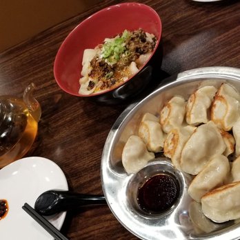 You Kitchen - Pickled veggies and pork pan fried dumplings and szechuan dan dan thick noodles (top) - Noodles Near Me - Alhambra, California You Kitchen - Pickled veggies and pork pan fried dumplings and szechuan dan dan thick noodles (top) - Noodles Near Me - Alhambra, California