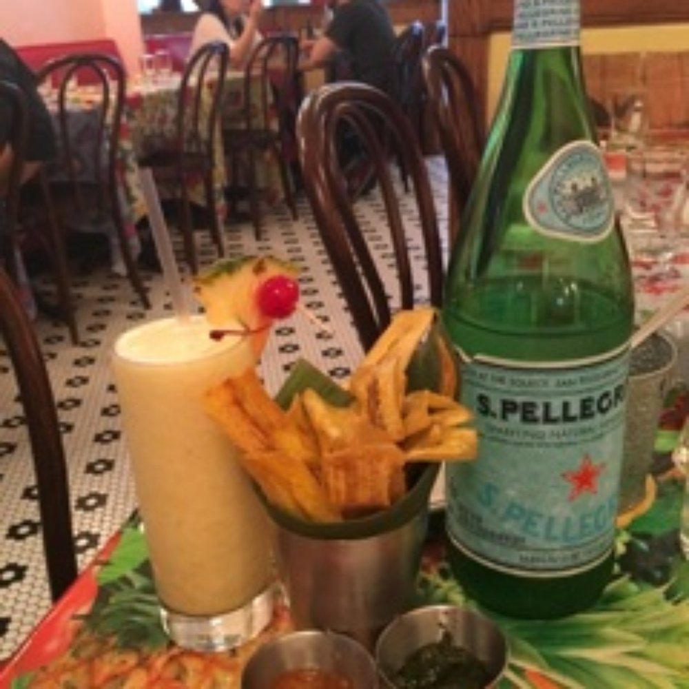 Cubana Cafe - Pina colada with plantain chips - Cuban Near Me - Brooklyn, New York