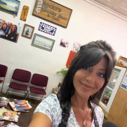 Rocky's Barber Shop - Crissy waiting to brighten people's day!