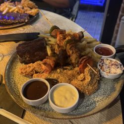 Route 66 - Trio platter with ribs and kabobs fries and chicken tenders