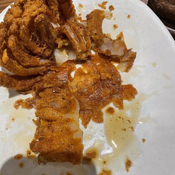 Outback Steakhouse - Blooming onion - leaking grease - Steakhouses Near Me - Beaumont, Texas Outback Steakhouse - Blooming onion - leaking grease - Steakhouses Near Me - Beaumont, Texas