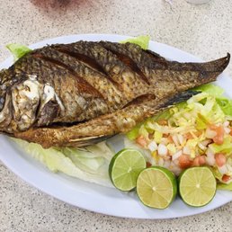 Mojarra Frita (Fried Fish), Salad, Rice & Tostones/Patacón (Fried Green Plantains) Mojarra Frita (Fried Fish), Salad, Rice & Tostones/Patacón (Fried Green Plantains)
