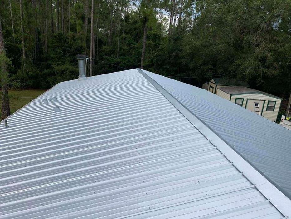 Slide of All American Roofing & Exteriors