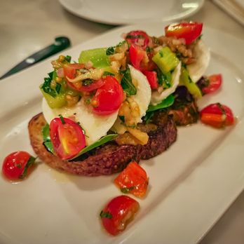 Impasto - a plate of food on a table - Italian Near Me - Montreal, Quebec Impasto - a plate of food on a table - Italian Near Me - Montreal, Quebec