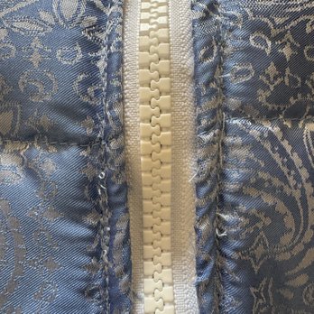 Sam’s Tailoring and Alteration - Attempt 2: zoom in on stitching along zipper. Uneven and poorly finished. - Sewing & Alterations Near Me - Houston, Texas Sam’s Tailoring and Alteration - Attempt 2: zoom in on stitching along zipper. Uneven and poorly finished. - Sewing & Alterations Near Me - Houston, Texas