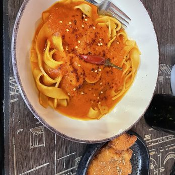 Turci Pasta - Spicy pasta and side of chicken - Italian Near Me - Orlando, Florida
