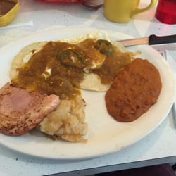 Jaliscos Cafe on West County Road - Juevos rancheros con jamon. Yum yum! And just spicy enough.