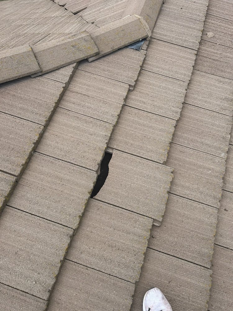 Slide of Alexander’s Roofing