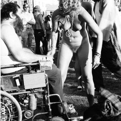 Telegraph Berkeley Historical Walking Tour - Pravda naked as usual wearing love beads. Pravda had just taken off the shirt of the man in wheelchair. This is in People's Park. Tom Brody
