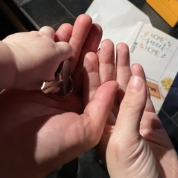 My boyfriend, 9 month old, and I holding the keys to our first home My boyfriend, 9 month old, and I holding the keys to our first home