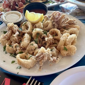 Micelis Waterfront Restaurant - Calamari w/ homemade marinara - Italian Near Me - Matlacha, Florida Micelis Waterfront Restaurant - Calamari w/ homemade marinara - Italian Near Me - Matlacha, Florida