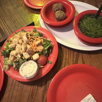 Pequod's Pizza - salad with the full Ravioli with meatballs and basil pesto - Pizza Near Me - Chicago, Illinois