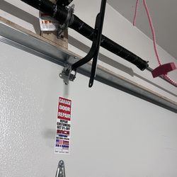 Sac's Garage Door Repair - Failure:  one screw which popped out.