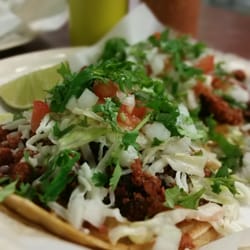 Carniceria San Jose - Taco: chorizo, cilantro, cebolla, queso, jitomate y lechuga