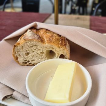 Naschmarkt - Complimentary bread and more butter than required for three slices. - Austrian Near Me - Pleasanton, California