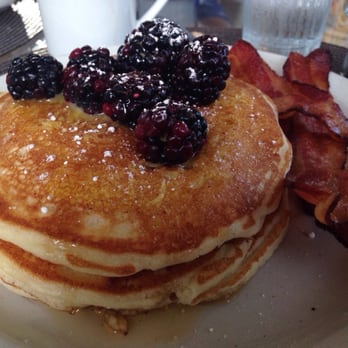Station 400 - Ricotta lemon curd pancakes, side of bacon. - American Near Me - Sarasota, Florida Station 400 - Ricotta lemon curd pancakes, side of bacon. - American Near Me - Sarasota, Florida