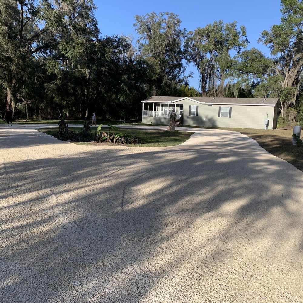 Affordable Home Remodeling - a driveway in front of a mobile home - General Contractors Near Me - Inverness, Florida
