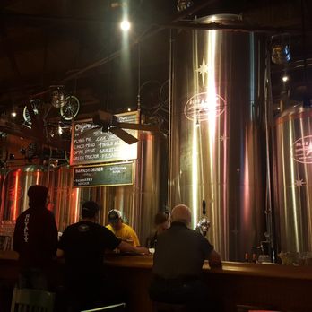 Blue Star Brewing - Brew tanks behind bar. - Venues & Event Spaces Near Me - San Antonio, Texas