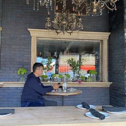 We opted for the indoor high top seating. Traditional seating in the outside patio available for larger groups. We opted for the indoor high top seating. Traditional seating in the outside patio available for larger groups.