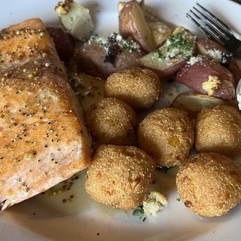 The Blind Pelican - Maple Salmon, Hush Puppies, Red Parmesan Potatoes - Seafood Near Me - Holly Springs, North Carolina The Blind Pelican - Maple Salmon, Hush Puppies, Red Parmesan Potatoes - Seafood Near Me - Holly Springs, North Carolina