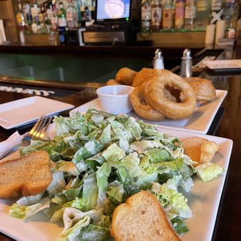 Uncle Tommy’s Tavern - Caesar salad and MASSIVE, homemade onion rings. They are huge but tasted so light! - Irish Pub Near Me - Pearl River, New York Uncle Tommy’s Tavern - Caesar salad and MASSIVE, homemade onion rings. They are huge but tasted so light! - Irish Pub Near Me - Pearl River, New York