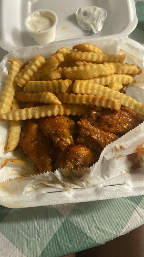 Zacks Wings & Seafood Logo