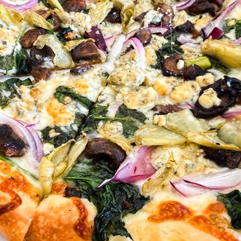 Red Rooster Brick Oven - Close up of the Blue Pizza. - Pizza Near Me - San Rafael, California Red Rooster Brick Oven - Close up of the Blue Pizza. - Pizza Near Me - San Rafael, California