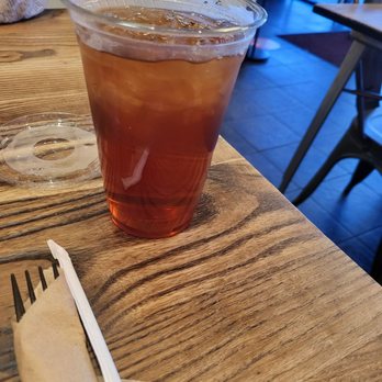 Geneva's Famous Chicken and Cornbread - Iced tea (served in plastic cup even when dining in) - Southern Near Me - Savannah, Georgia Geneva's Famous Chicken and Cornbread - Iced tea (served in plastic cup even when dining in) - Southern Near Me - Savannah, Georgia