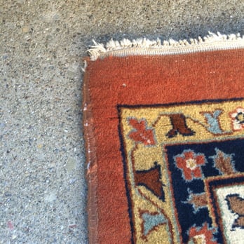 Palayan's Oriental Rugs - This not even close to the worst part of our poor rug before Mr. Palayan's miracle. - Rugs Near Me