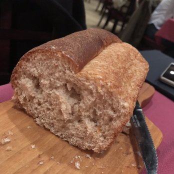 The Ribeye - Wheat bread (sorry half eaten) - Steakhouses Near Me - Champaign, Illinois The Ribeye - Wheat bread (sorry half eaten) - Steakhouses Near Me - Champaign, Illinois