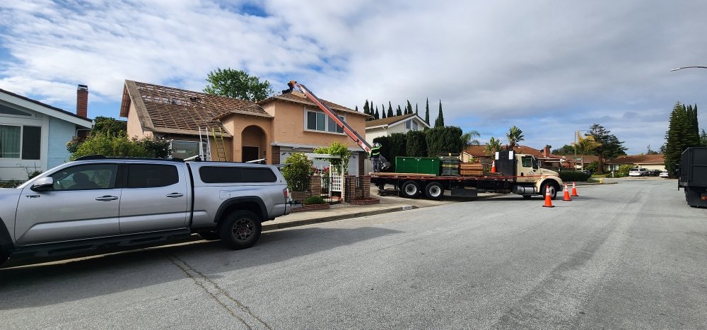 Slide of Julio & Family Roofing