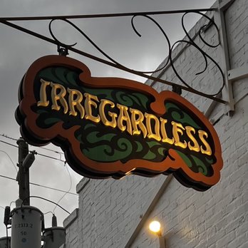 Irregardless Cafe - a neon sign on the side of a building - New American Near Me - Raleigh, North Carolina Irregardless Cafe - a neon sign on the side of a building - New American Near Me - Raleigh, North Carolina