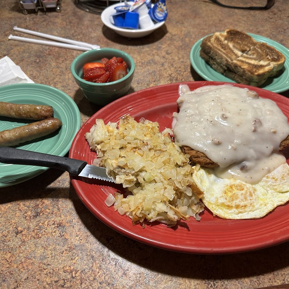 Chicken fried steak, hashbrowns, we added onions Chicken fried steak, hashbrowns, we added onions