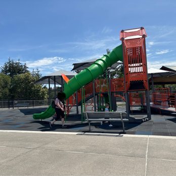 Cirque Park - (Entrance to the left) another angle of the large play structure and tall/fast slide - Parks Near Me - University Place, Washington Cirque Park - (Entrance to the left) another angle of the large play structure and tall/fast slide - Parks Near Me - University Place, Washington