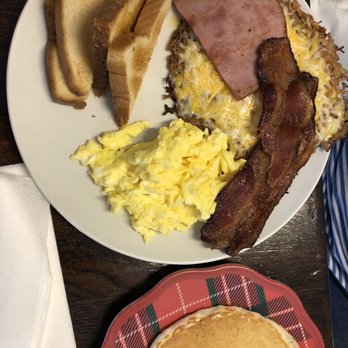 MJs Grill - a breakfast of eggs, bacon and pancakes - American Near Me - Elberta, Alabama