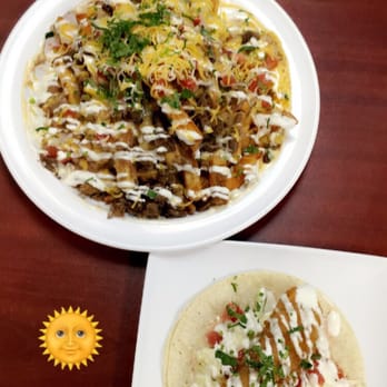 Costa Grande - Carne Asada Fries w/ a single fish taco. featuring: sunny face emoji. - Mexican Near Me - Van Nuys, California Costa Grande - Carne Asada Fries w/ a single fish taco. featuring: sunny face emoji. - Mexican Near Me - Van Nuys, California