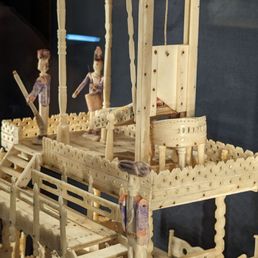 Carved guillotine toy, complete with beheading Carved guillotine toy, complete with beheading