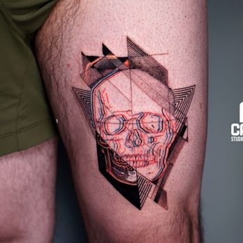 Caasi Tattoo Studio - Geometric skull tattoo in SoHo NYC with fine line detail, layered shapes, and a clean, modern edge. - Tattoo Near Me - New York, New York Caasi Tattoo Studio - Geometric skull tattoo in SoHo NYC with fine line detail, layered shapes, and a clean, modern edge. - Tattoo Near Me - New York, New York