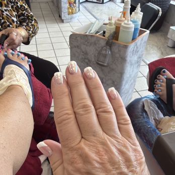 Clearwater Beach Nails & Spa - Dip with French and chrome. Pedicure in progress! - Nail Salons Near Me - Clearwater, Florida