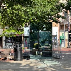Tesla Supercharger - There are bathrooms past all the shops at the town square (with a splash pad) in the mirrored boxes.