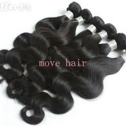 Crown Beauty Supply - The virgin hair weave bundles are in the long plastic bag.